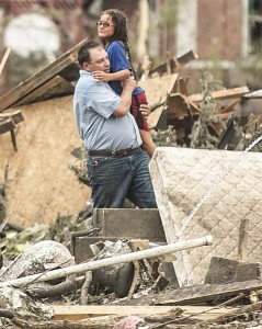 A girl who was pulled from the basement of her destroyed home in Pilger, Nebraska, on Monday.