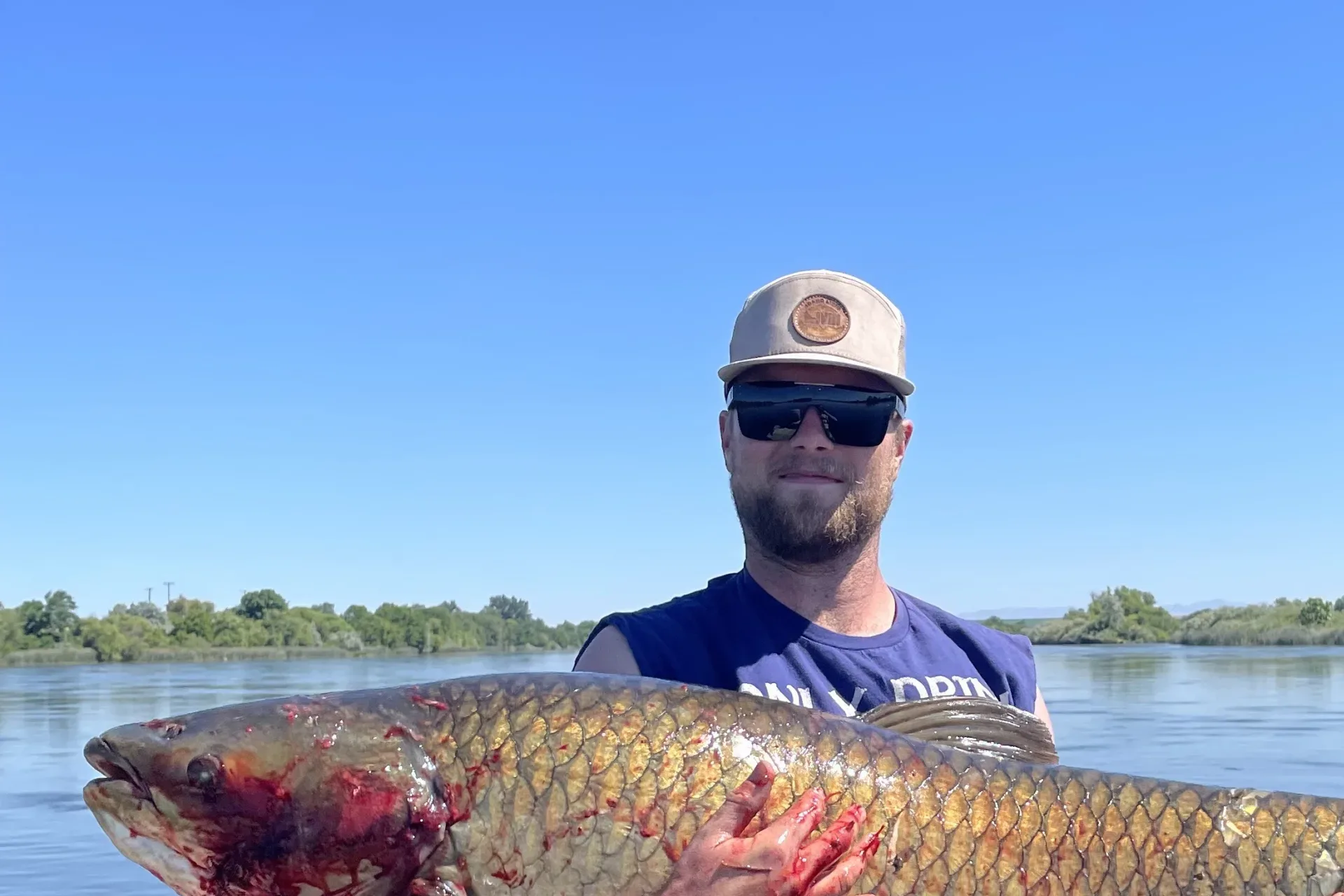 Archery angler shatters state record for grass carp