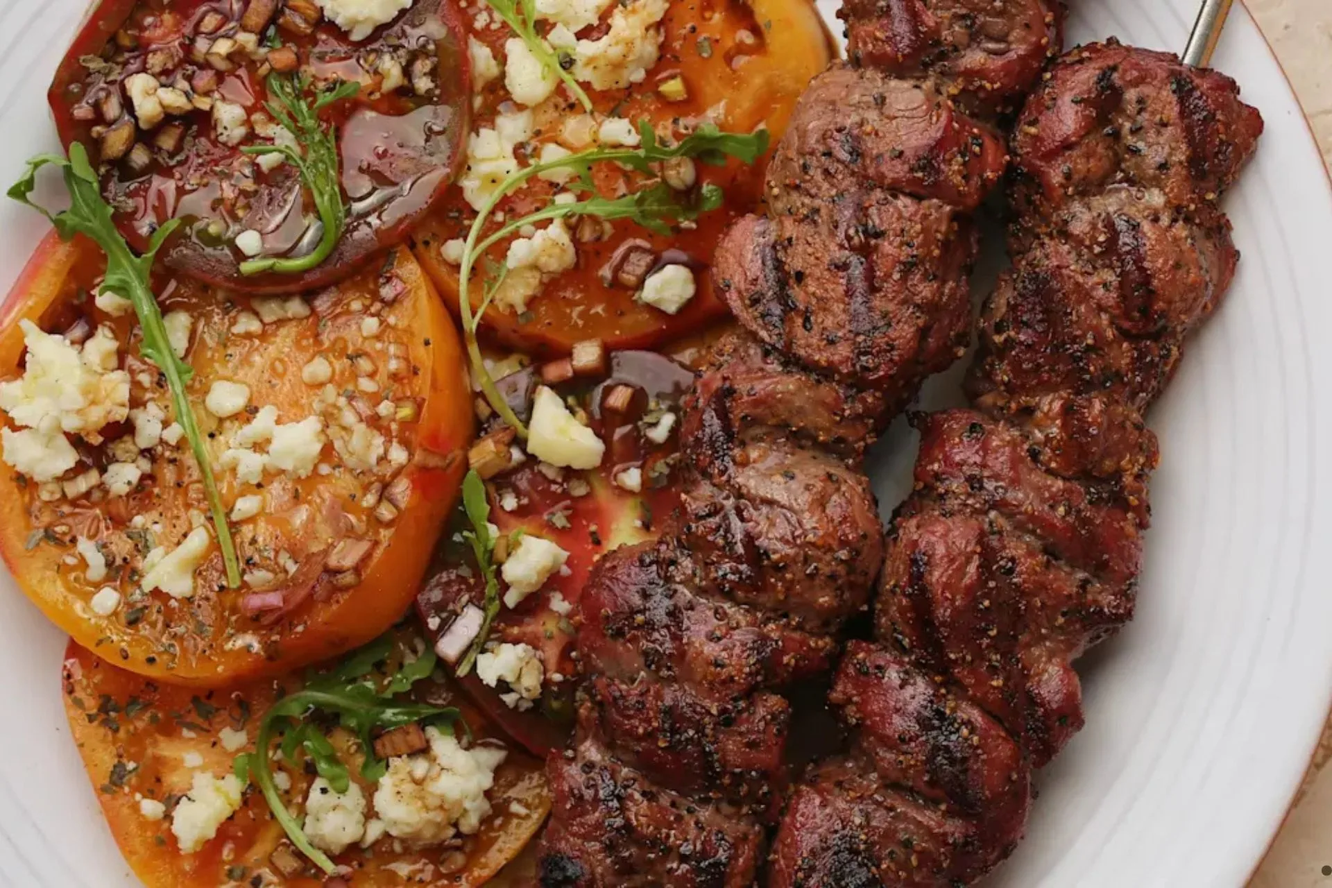 Cooking with Kokanee Quinn: Grilled Venison with Summer Tomato Salad