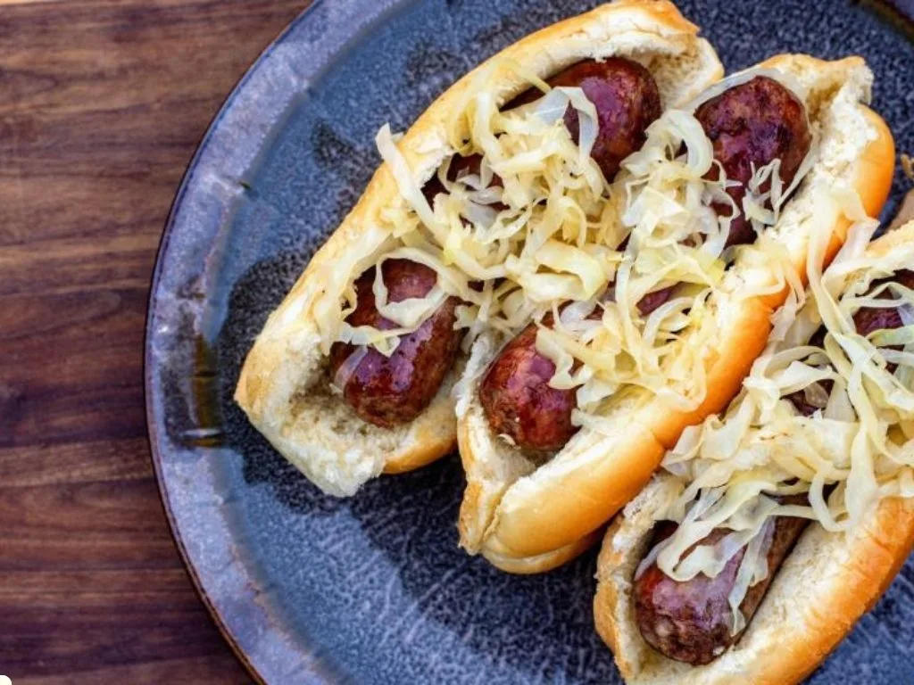 Cooking with Kokanee Quinn: Wisconsin-Style Venison Brats and Hard-Cider Kraut Recipe
