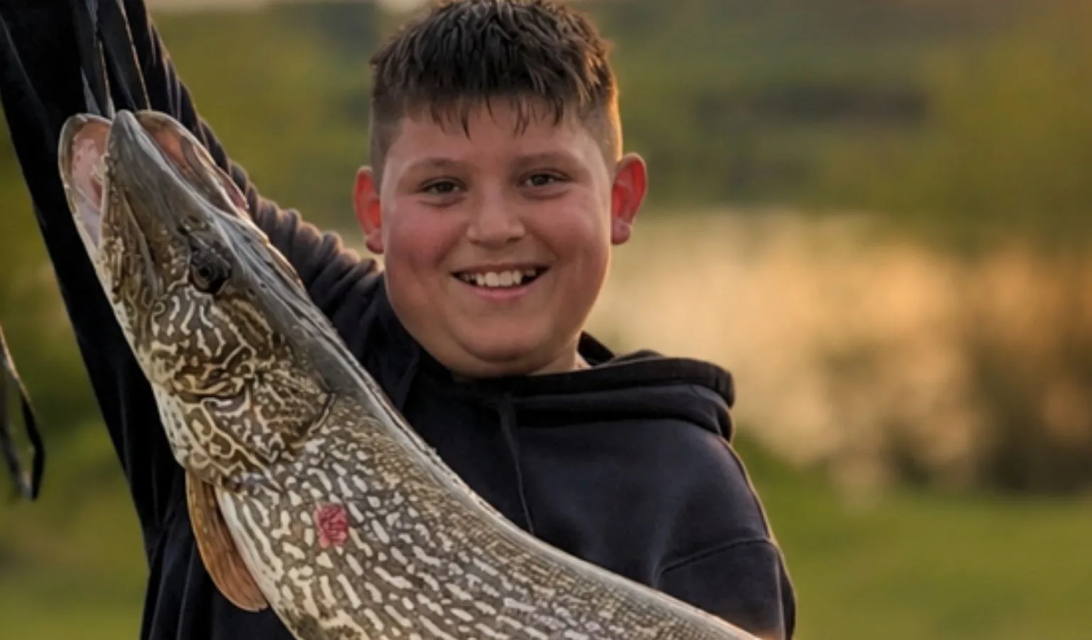Young Angler Hooks Unbelievable Northern Pike