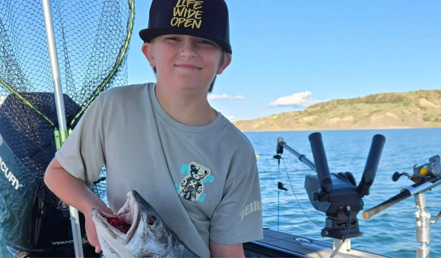 Young Angler Jigs Deep for Fort Lake Trout!