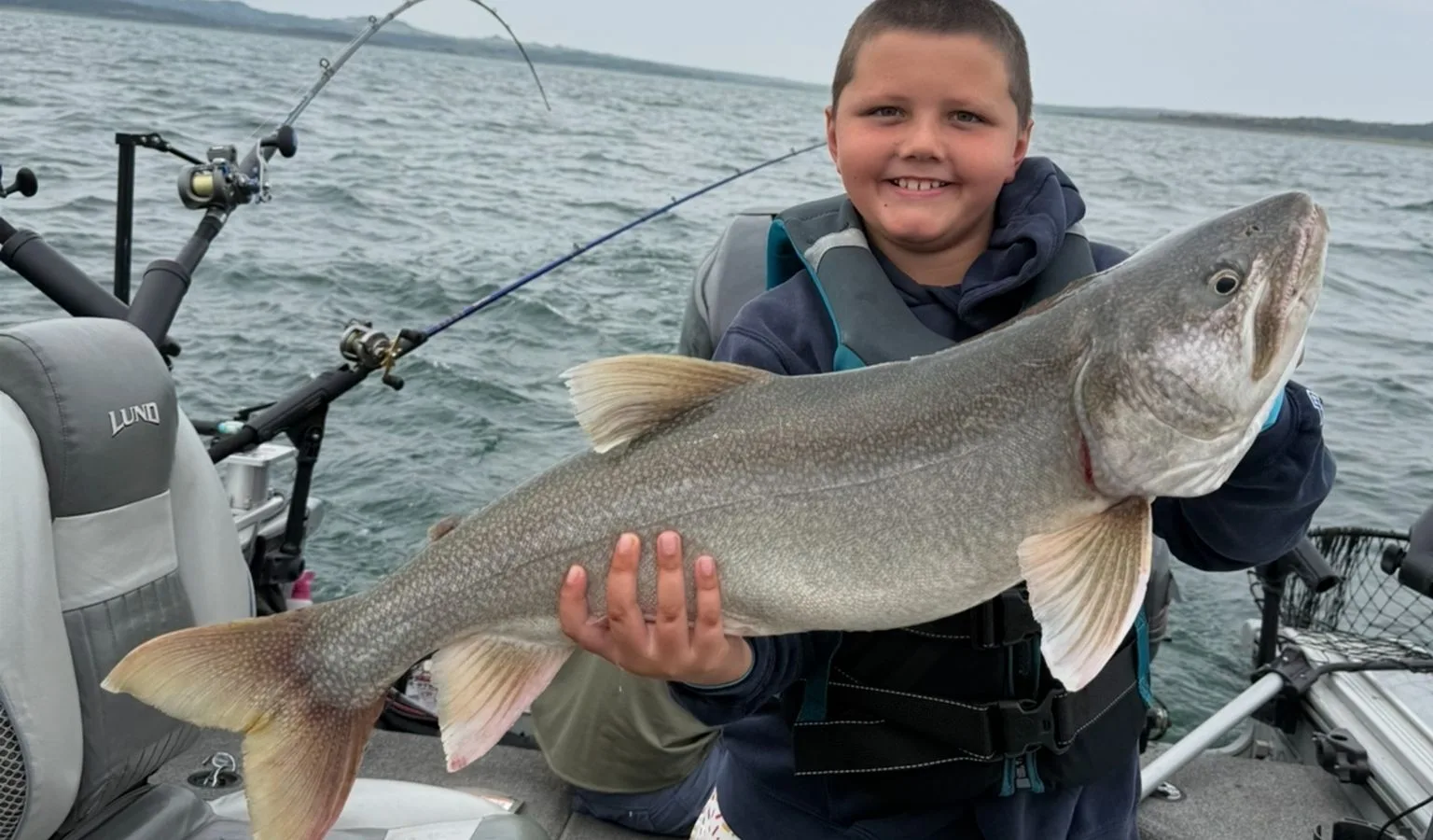 Reeling in Memories: 8-Year-Old Conquers Fort Peck Through the Elements